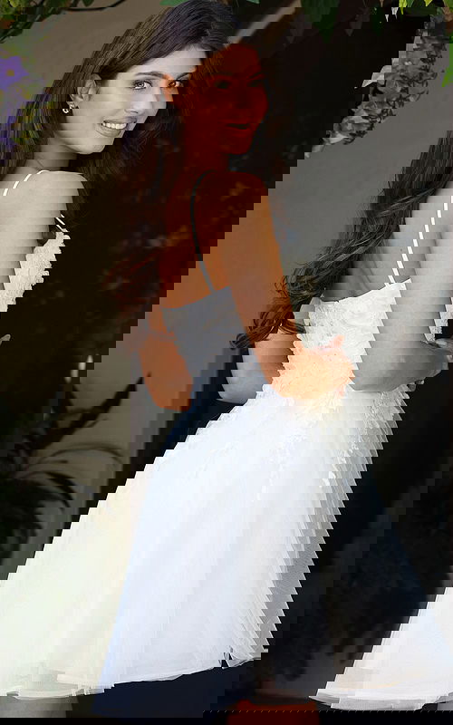 Jovani K45717 off white spaghetti strap short A line dress back view showing 3D floral lace applique bodice and tulle flare skirt