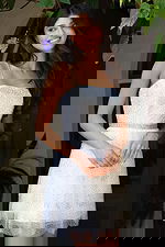 Jovani K45723 white one shoulder short A line dress with scattered crystal rhinestone embellishments, beaded waistband, and tulle overlay skirt