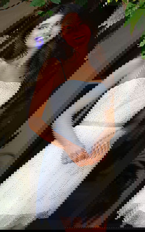 Jovani K45723 white one shoulder short A line dress with scattered crystal rhinestone embellishments, beaded waistband, and tulle overlay skirt