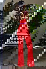 Sleeveless wide leg jumpsuit with contrast straps and defined waist ban