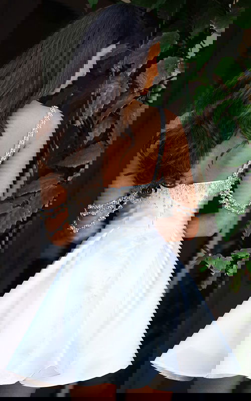 Jovani K48024 off white satin square neck short A line dress with crystal beaded neckline, draped rhinestone arm chain details, and full pleated flare skirt