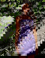 Lilac fitted mini dress with floral embellishments and thin straps