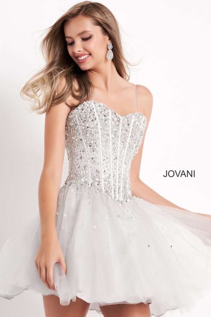 Model showcasing Jovani K59903 in silver with dazzling bodice