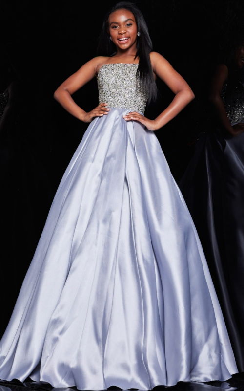 Model wearing Jovani K66689 stunning lilac gown with embellishments