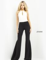 Model wearing Jovani M02807 jumpsuit, front view with halter neckline and flared black pants.