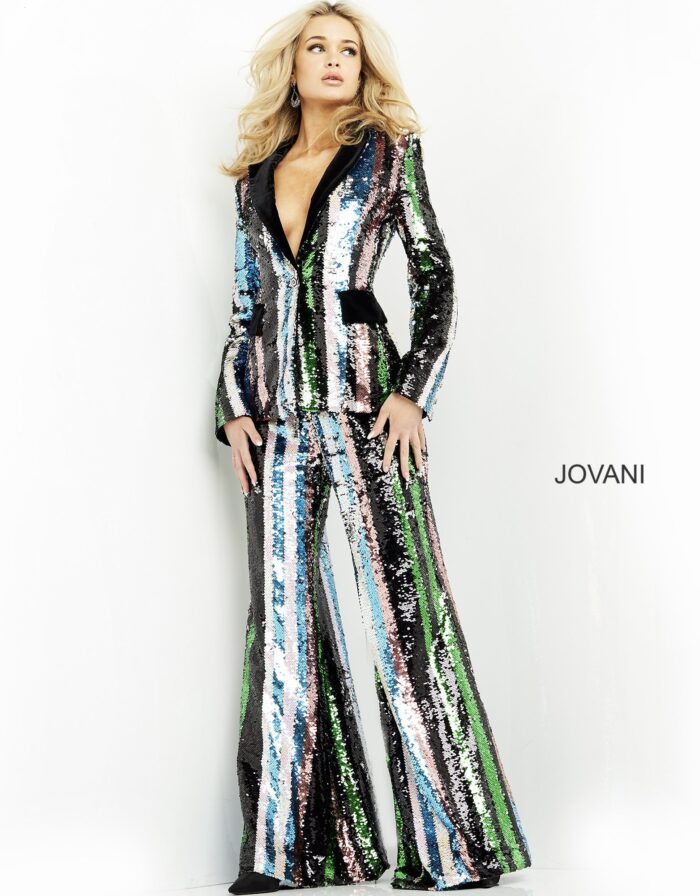 Model showcasing Jovani M02942, capturing the full length and shine of the pantsuit.