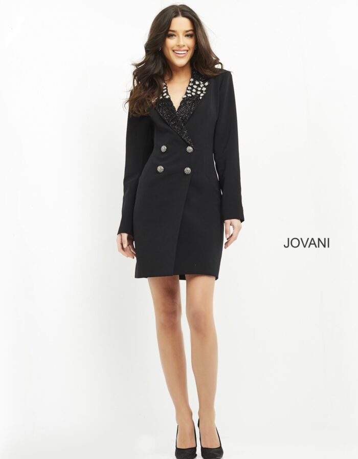 Full view of model wearing Jovani M03416 black dress with long sleeves and embellished neckline.
