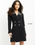 Model wearing Jovani M03416 black dress with embellished neckline and long sleeves, front view.