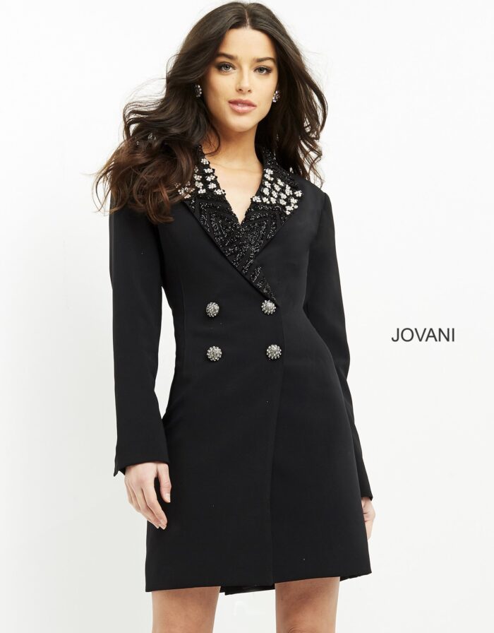 Model wearing Jovani M03416 black dress with embellished neckline and long sleeves, front view.