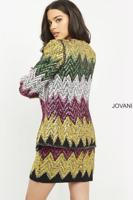 Model wearing Jovani M05038 multi-colored zigzag pattern dress from the back.