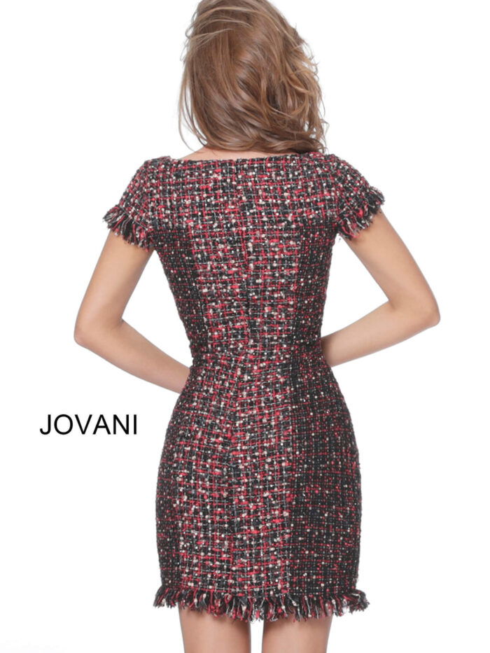 Back view of model wearing Jovani M1042 short multi-colored tweed dress with cap sleeves and fringe detailing.