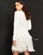 Back view of Jovani M1262 ivory dress highlighting feather trim.