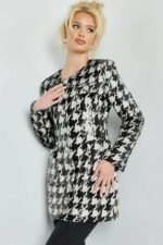 Model wearing M3393 black and ivory houndstooth dress with button details, full front view.