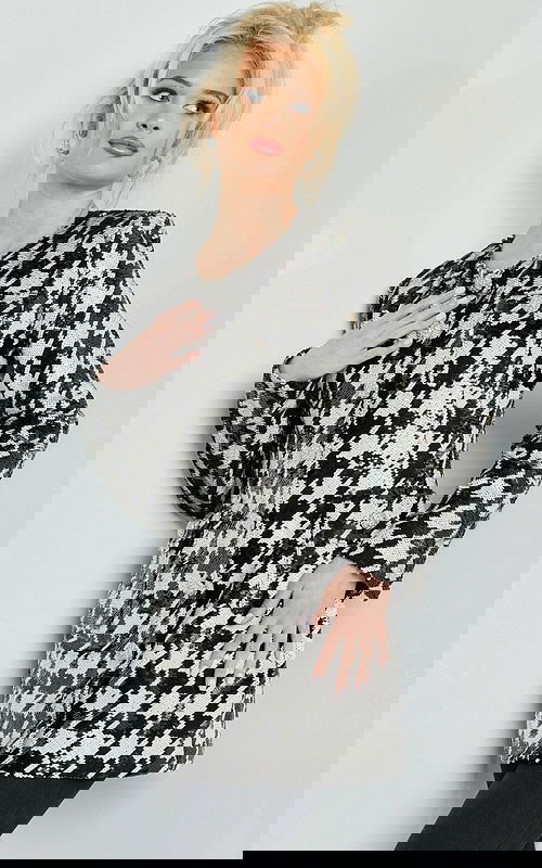 Model wearing M3393 black and ivory houndstooth dress with button details, full front view.