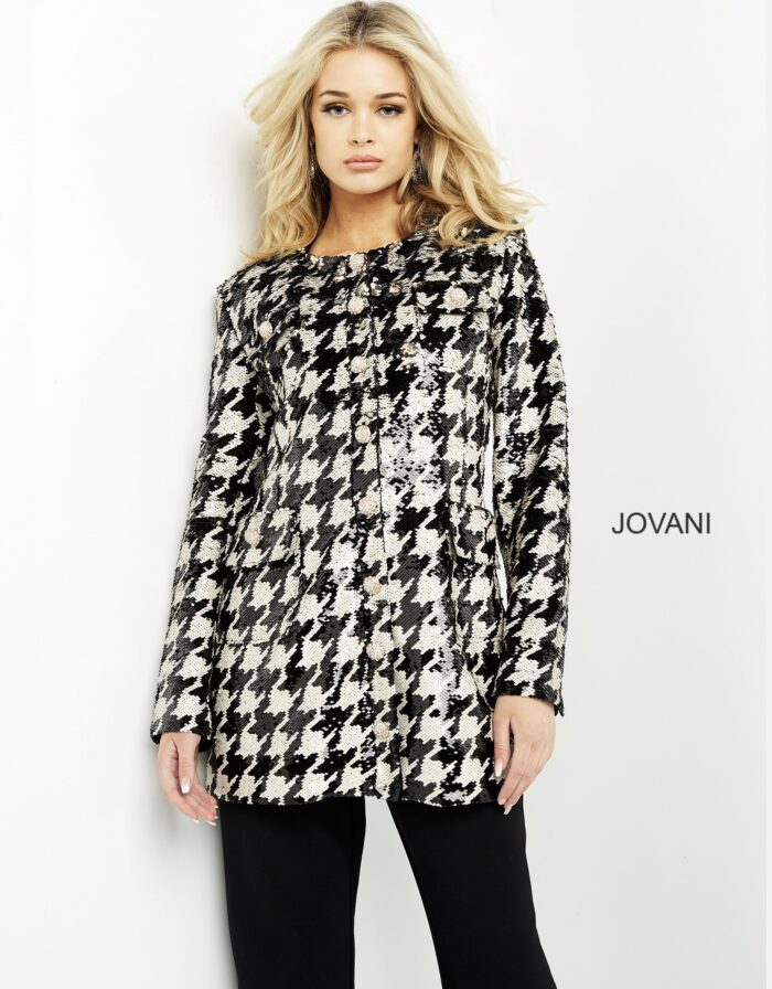 Model wearing M3393 front view black and ivory houndstooth dress with classic design.