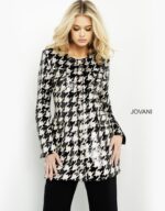 Model in M3393 black and ivory houndstooth dress, front view.