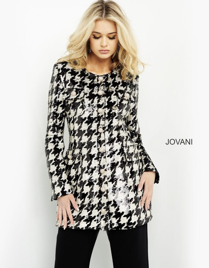 Model in M3393 black and ivory houndstooth dress, front view.