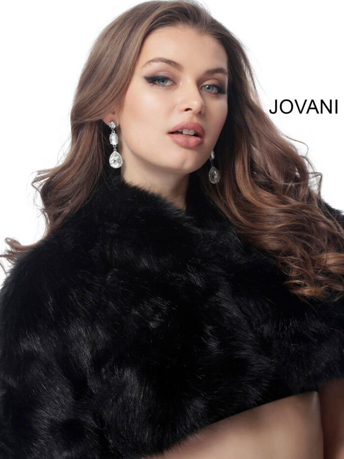 Model wearing Jovani M50165 elegant black dress front view.