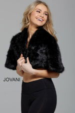 Model wearing Jovani M50165 black dress, showing the back.