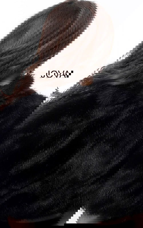 Model showing back view of Jovani M50165 black dress.