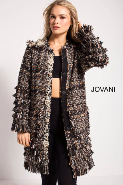 Model showcasing Jovani M54805 coat with intricate textures and embellishments from the front