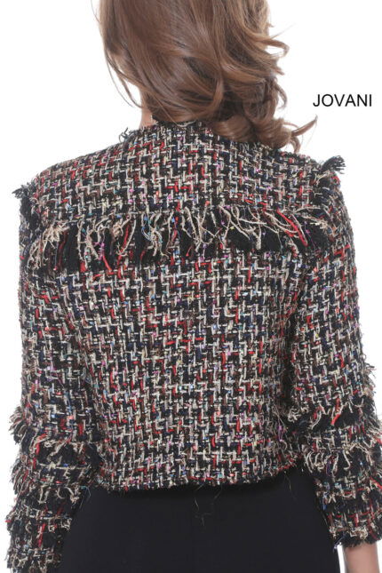 Back view of model wearing Jovani M61374 jacket showing textured fabric.