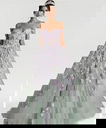 Off-shoulder green ball gown with lilac floral appliqués