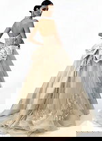 Strapless champagne ball gown with oversized bow back