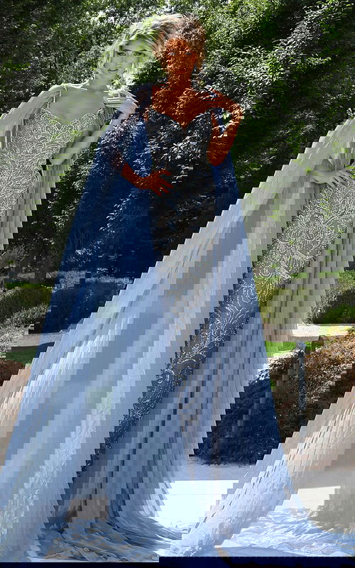 Light blue beaded gown with sheer cape and sweetheart neckline