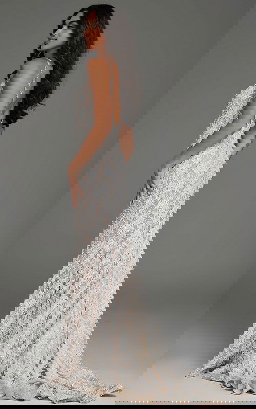 Model wearing S60534 elegant white lace gown, side view showcasing low back design.