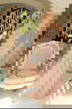 Elegant pink gown with sequin embroidery and flowing tulle layers