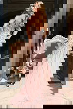 Glamorous beaded gown with sheer plunging front and mermaid silhouette