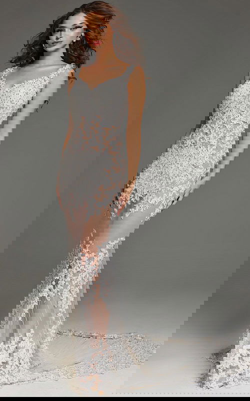 model wearing S65052 front view with lace embroidery and train