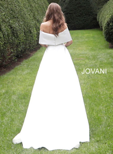 Model wearing Jovani S68287 white off-the-shoulder bridal gown back view.