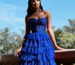 blue layered dress|best styles of 2024 prom|beaded sheer prom design|short prom dress|short prom style with bow detail.|fringe prom designs|cut out prom dress|apricot the color of 2024|