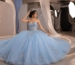 Blue quinceanera gown in luxury studio