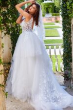 Back view of model in Jovani jb09393 showcasing flowing white ball gown train