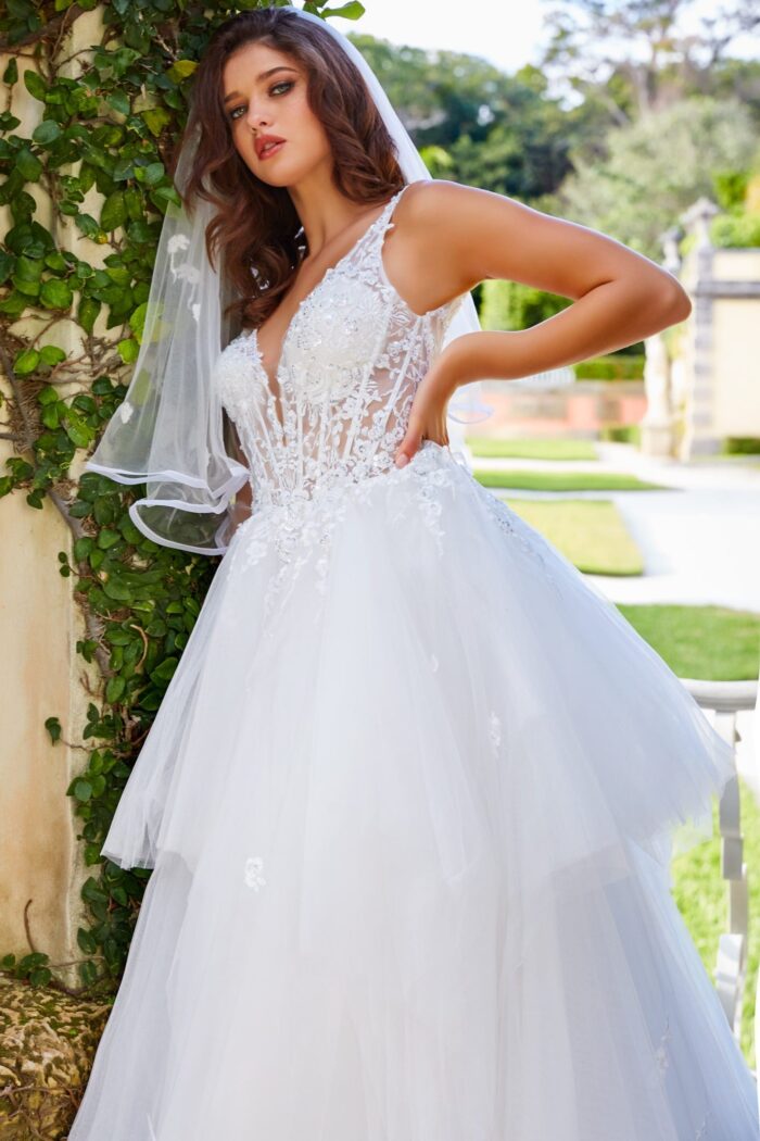 Close-up of Jovani jb09393 front lace detail and V-neckline on white gown