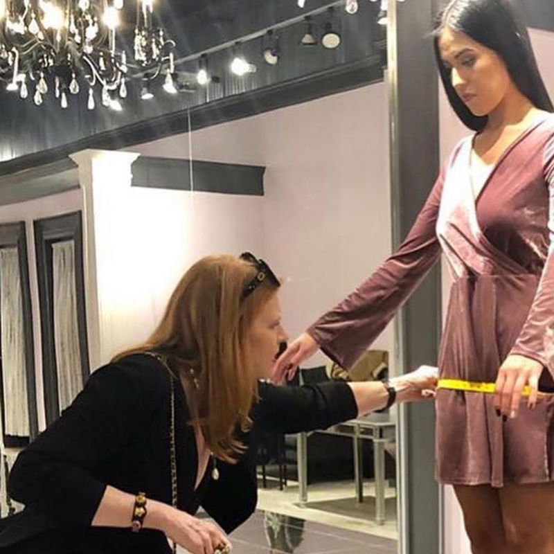 Julie designing dresses in Jovani showroom