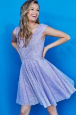 Model in Jovani K04446 lilac dress with cap sleeves and shimmering details, front view.