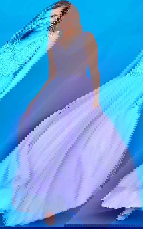 Model showing K06822 lilac A-line gown with flowing skirt and lace bodice in full front view.