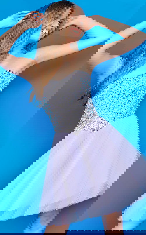 Model wearing K22231 lilac dress with sweetheart neckline and sequins, front view.