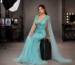 Pageant contestant in aqua crystal gown