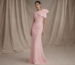 Floor length pink fitted evening gown with shoulder bow