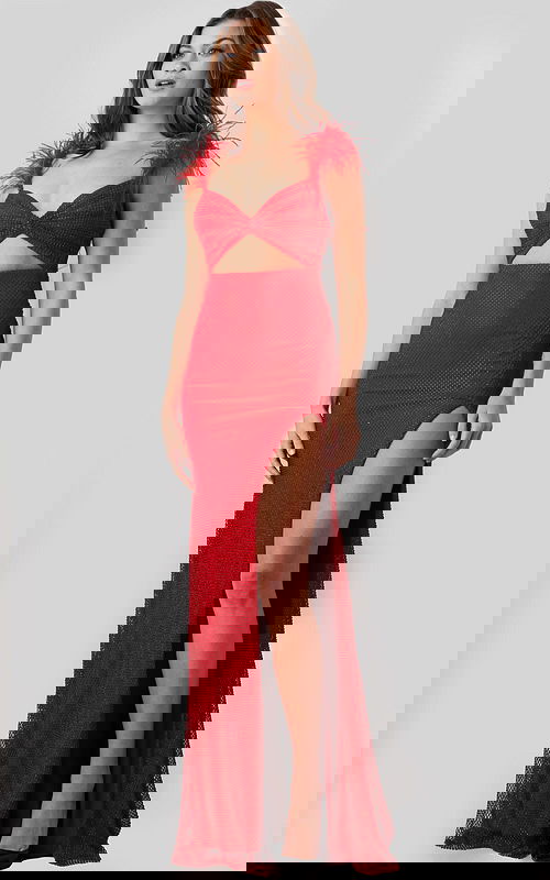 Model wearing Jovani 24095 in red, front view with high slit and feathered shoulders.