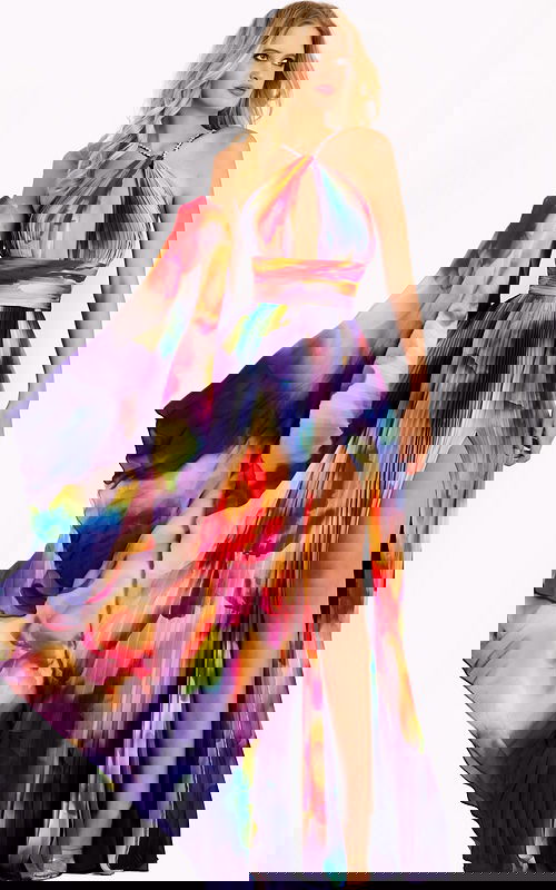 Sleeveless chiffon halter gown with pleated skirt and waist detail