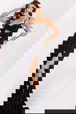 Elegant black prom dress with sparkling beadwork and open back