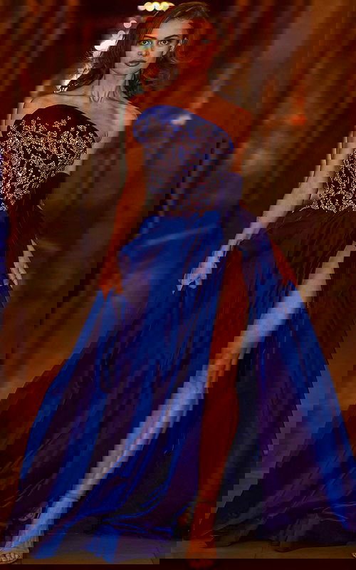 Model wearing S06347 navy gown with one-shoulder neckline and embellished bodice