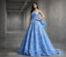 Strapless blue ball gown with defined waist